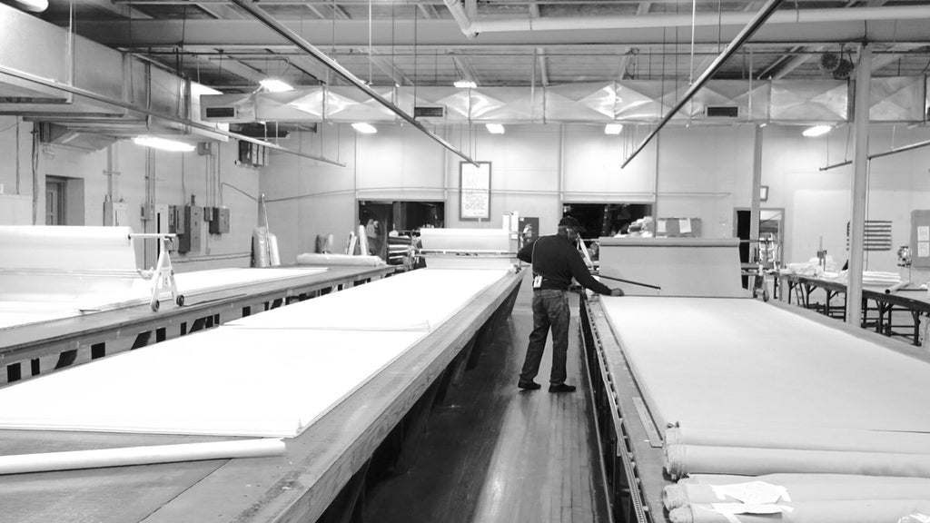 Laying up cotton fabric for Made in America bed sheets